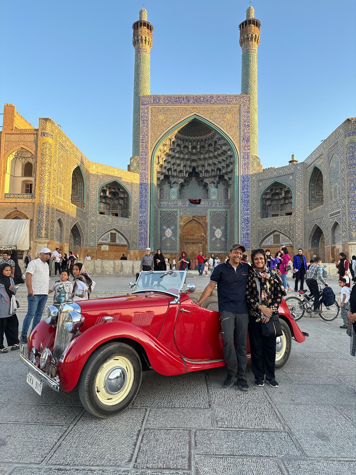 In front of the Shah Mosque in Iran.