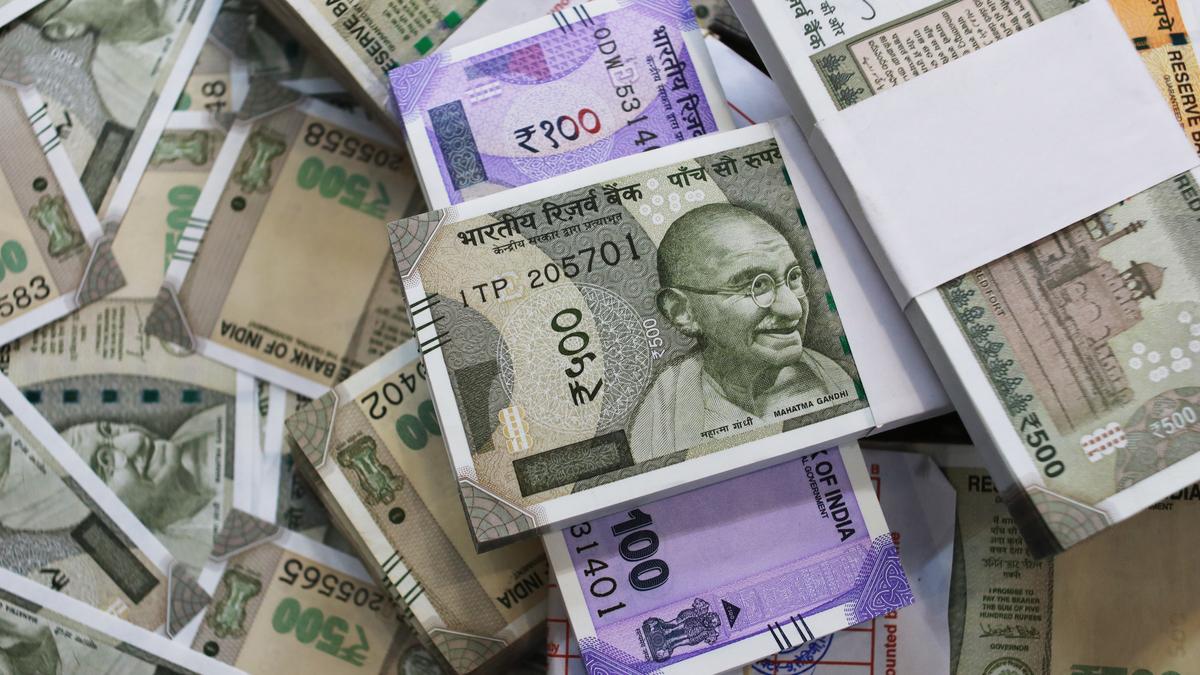 Amid global tumult, Rupee breaches 87 against dollar