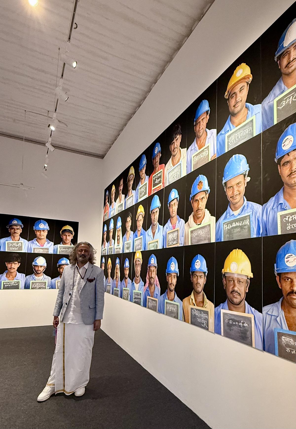 Artist Samar Jodha with his photographic exhibit Narratives of the Nameless. Artist Samar Jodha with his photographic exhibit Narratives of the Nameless.