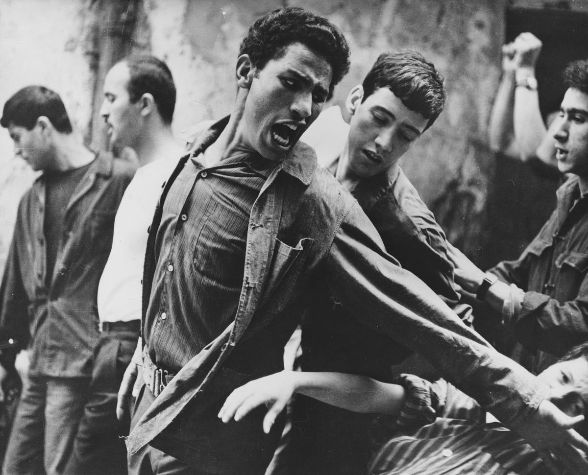Brahim Haggiag as revolutionary leader Ali La Pointe in a scene from Gillo Pontecorvo’s The Battle of Algiers Brahim Haggiag as revolutionary leader Ali La Pointe in a scene from Gillo Pontecorvo’s The Battle of Algiers