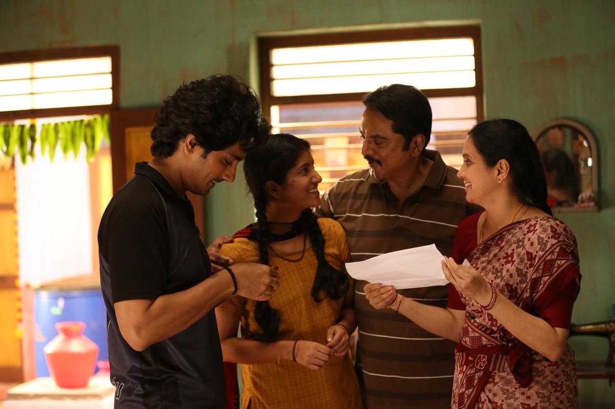 Siddharth, Sarath Kumar, Devayani and Meetha Raghunath in a still from ‘3BHK’