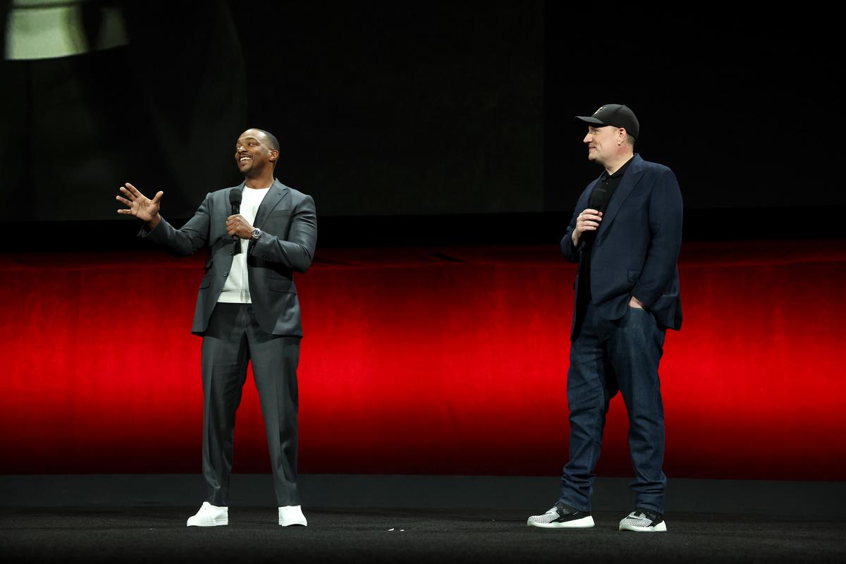 Anthony Mackie (L) and Kevin Feige, President, Marvel Studios speak onstage during the Walt Disney Studios presentation at Cinemacon in Las Vegas, Nevada on April 11, 2024