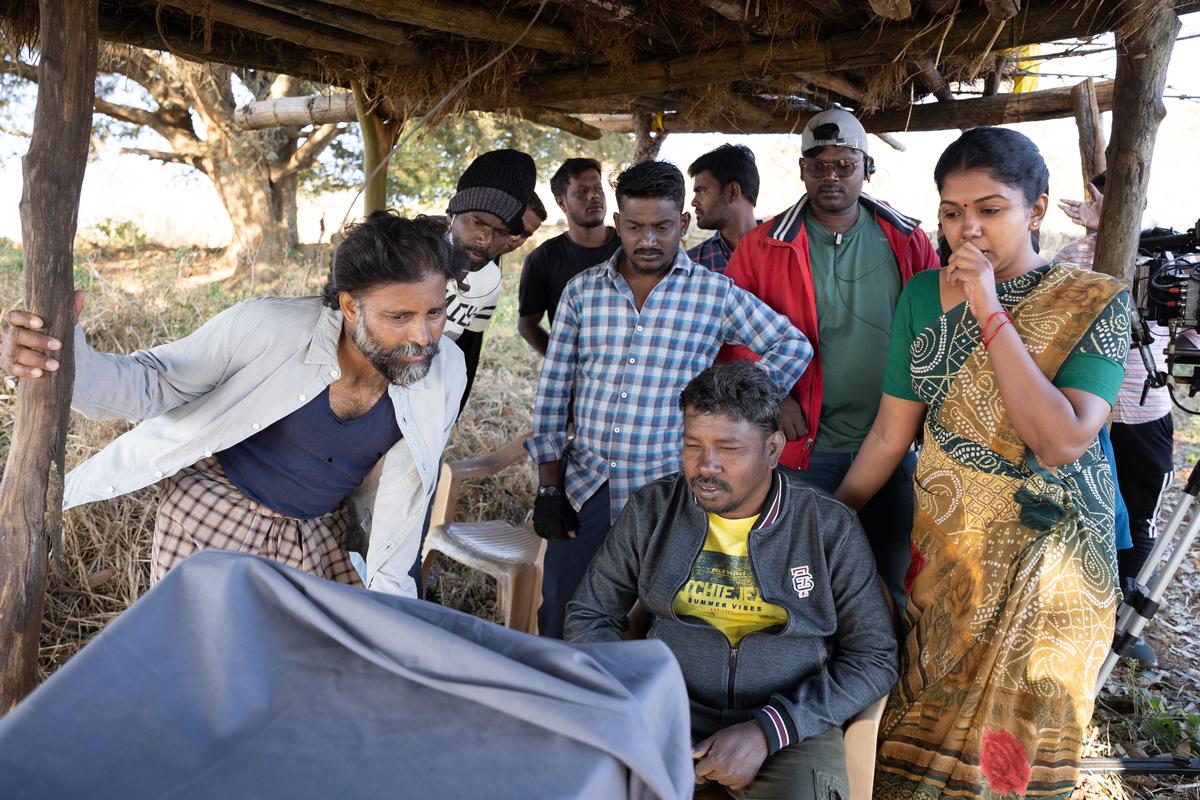 Dinesh, Athiyan Athirai and Riythvika on the sets of ‘Thandakaaranyam’ Dinesh, Athiyan Athirai and Riythvika on the sets of ‘Thandakaaranyam’