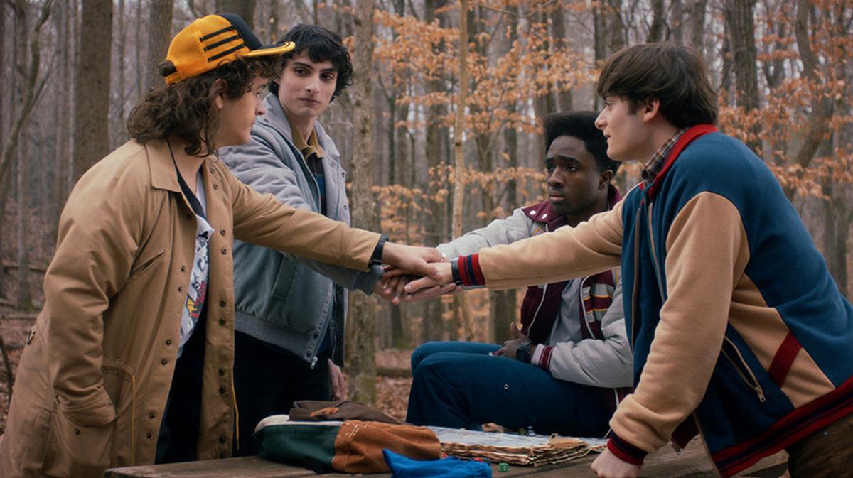 (L to R) Gaten Matarazzo as Dustin Henderson, Finn Wolfhard as Mike Wheeler, Caleb McLaughlin as Lucas Sinclair, and Noah Schnapp as Will Byers in a still from ‘Stranger Things 5’