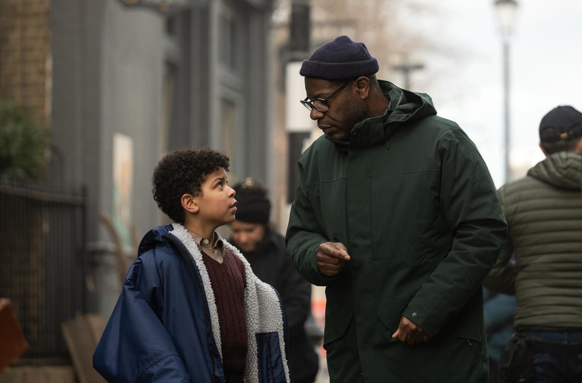 Elliot Heffernan and director Steve McQueen in a behind-the-scenes still from ‘Blitz’