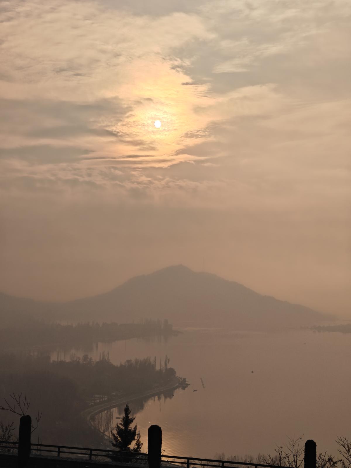 The sun sets over the Dal Lake in Srinagar, Kashmir