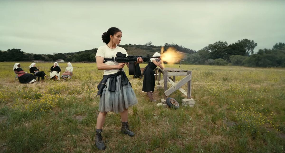 Chase Infiniti’s Willa firing an assault rifle at the Sisters of the Brave Beaver convent in a still from 