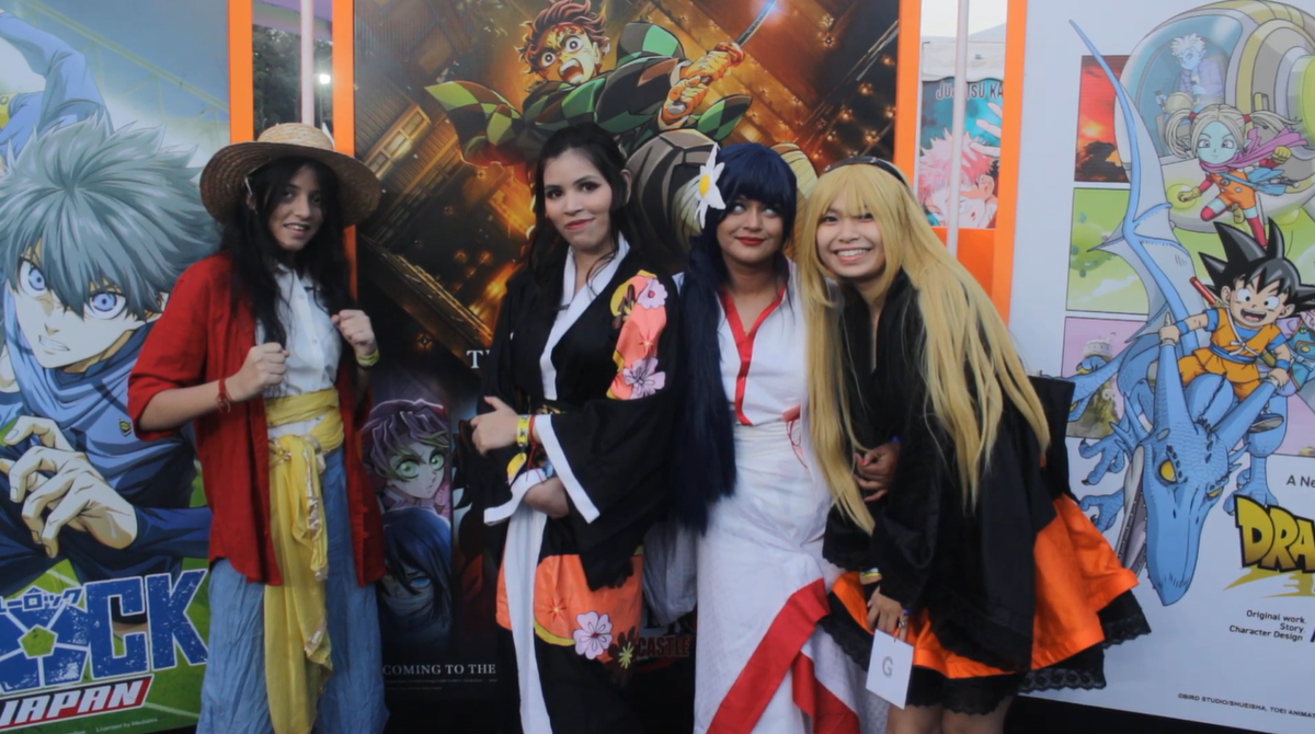 A group of cosplayers pose at the Crunchyroll arena at Comic Con Delhi 2024