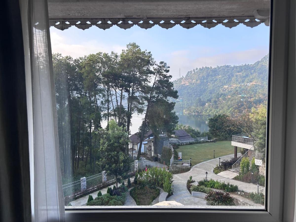 A view of the lake from a room at Naukuchia House A view of the lake from a room at Naukuchia House