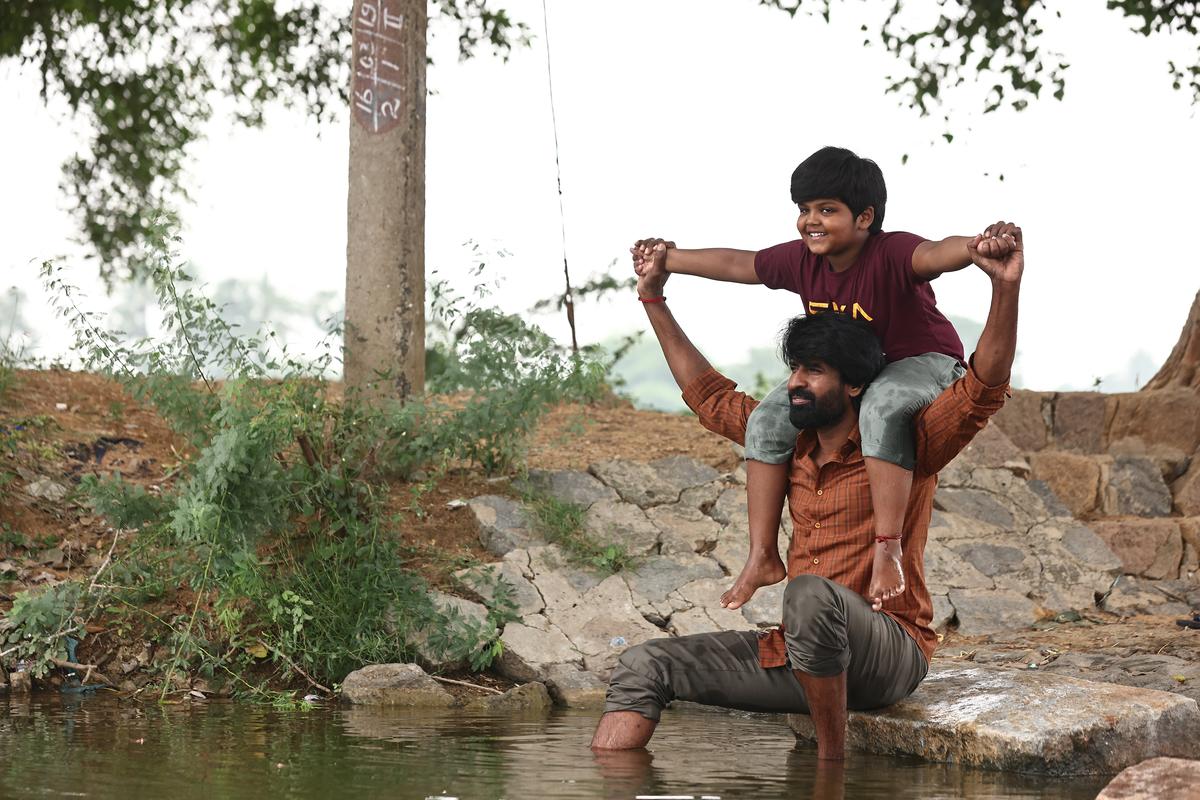 Prageeth Sivan and Soori in a still from ‘Maaman’