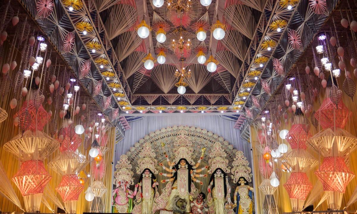 A Durga puja pandal illuminated with lights as part of Navaratri festival, in Dinajpur, Kolkata.  