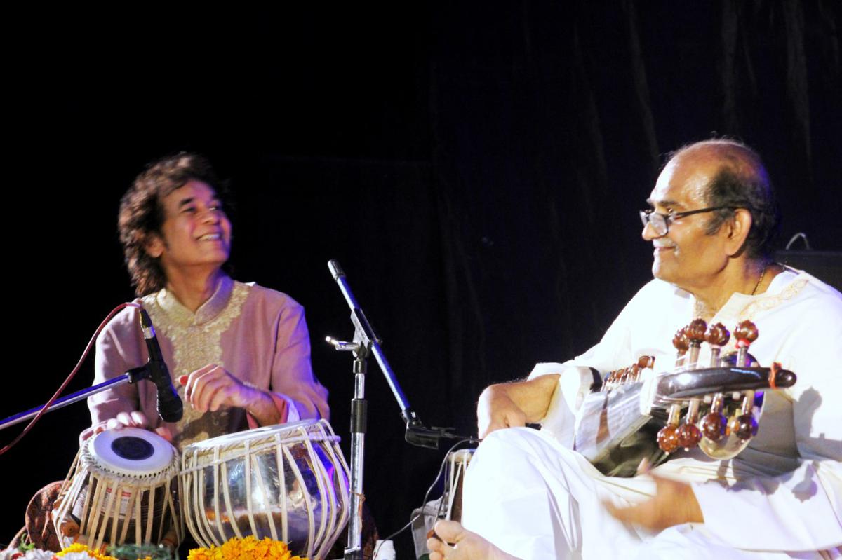 Pt. Basant Kabra accompanied by Ustad Zakir Hussain on the tabla.