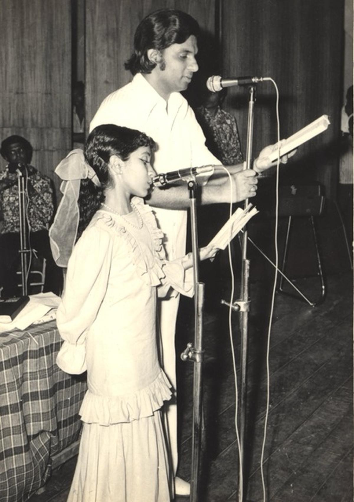 The young Sujatha sharing the stage with veteran singer K.J. Yesudas. The young Sujatha sharing the stage with veteran singer K.J. Yesudas.