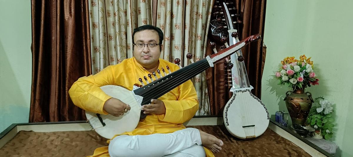 Joydeep Mukherjee playing the Tanseni Rabab. Joydeep Mukherjee playing the Tanseni Rabab.
