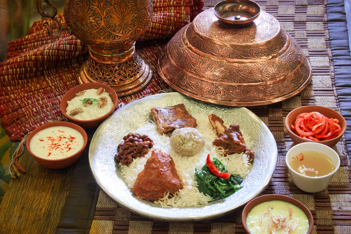 The Kashmiri wazwan served in a tarami, a beaten copper dish