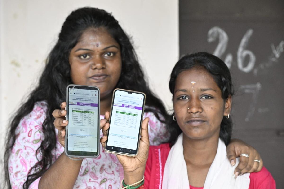 Students show their Plus two mark result on mobile phone in Vellore on May 8, 2026