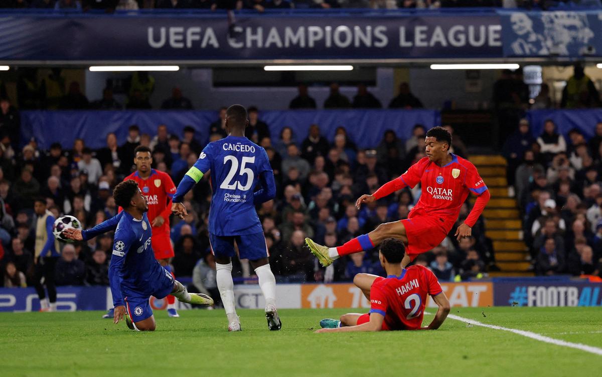 Paris St Germain's Senny Mayulu scores the third goal against Chelsea