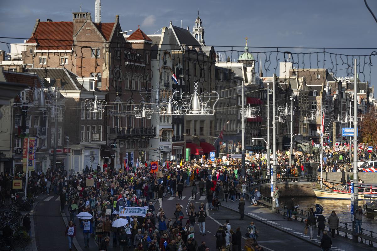 Thousands of people marched through Amsterdam, Netherlands, on November 12, 2023, to call for more action to tackle climate change. 