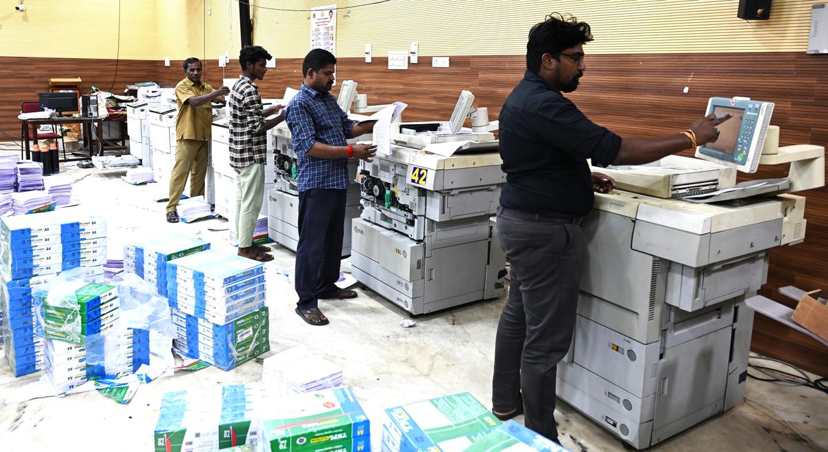 Officials preparing the enumeration forms ahead of the Special Intensive Revision (SIR) of the electoral roll at Tiruchi Collectorate. 