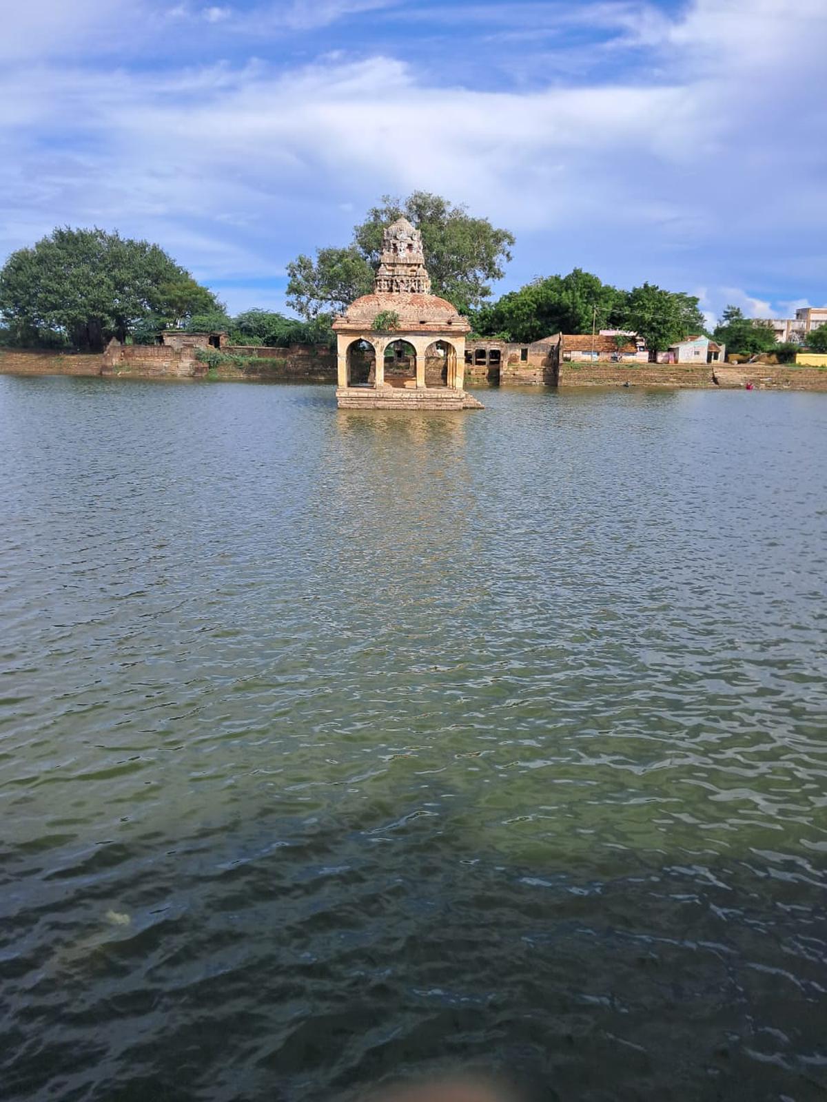 A view of the Neerali Mandapam in the midst of the temple tank