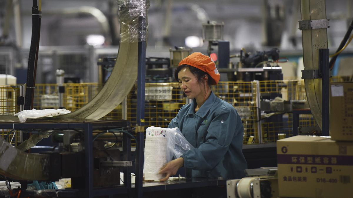 China’s July industrial profits down as COVID-19 curbs, heatwaves hit