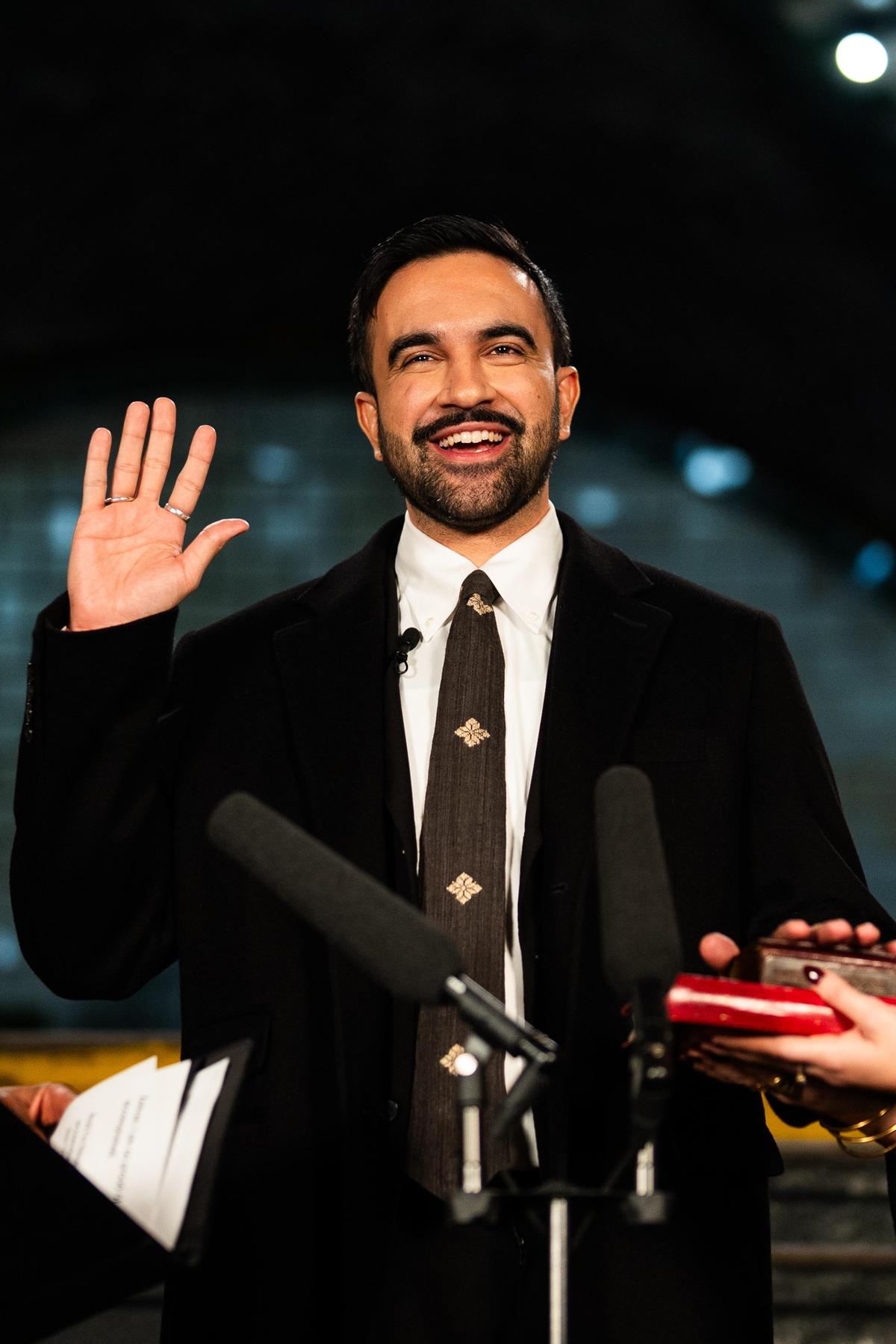 Zohran Mamdani takes the oath of office wearing a Kartik Research tie