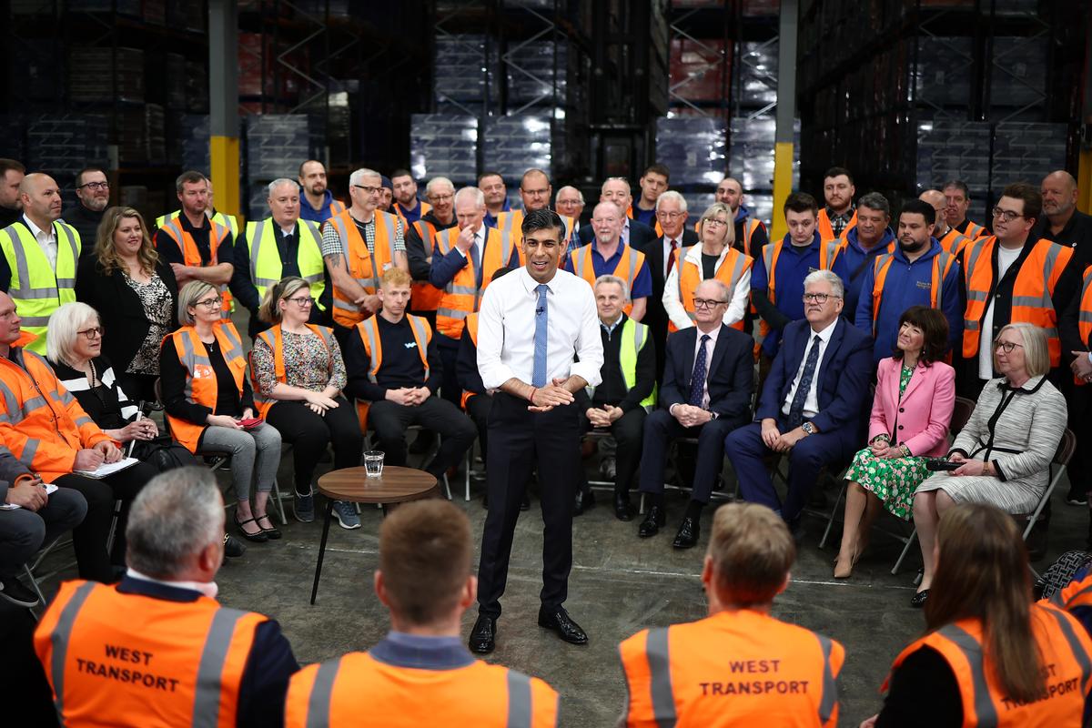Britain’s Prime Minister and Conservative Party leader Rishi Sunak holds a Q&A with staff of a West William distribution centre as part of a campaign event ahead of a general election on July 4 on May 23, 2024 in Ilkeston in the East Midlands.