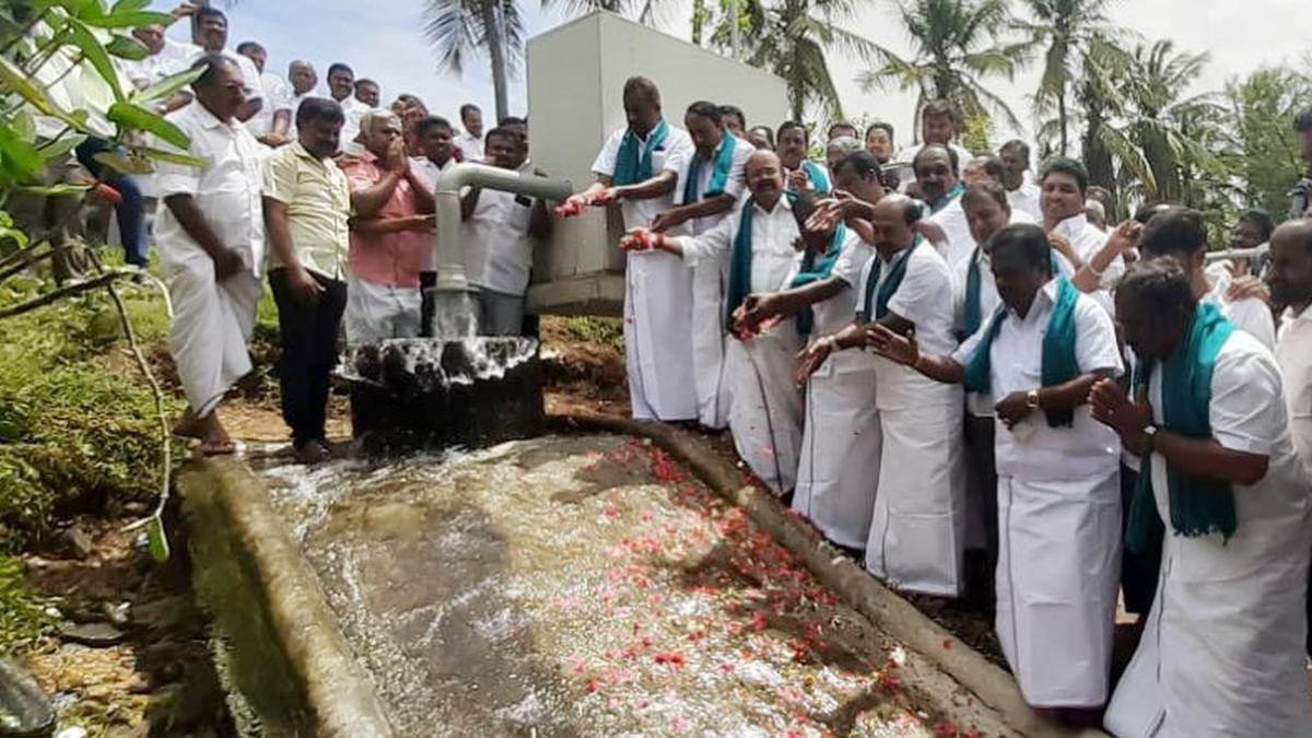 Claiming credit for Athikadavu-Avinashi project, AIADMK MLAs shower petals at Muriandampalayam pond in Tiruppur