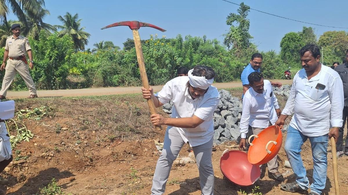Minister Madhu Bangarappa takes part in construction work of government school