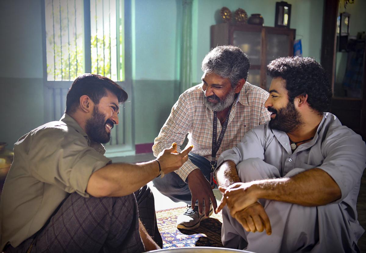 (L to R) Actor Ram Charan, director S.S. Rajamouli and actor NTR Jr. on the sets of ‘RRR’. 