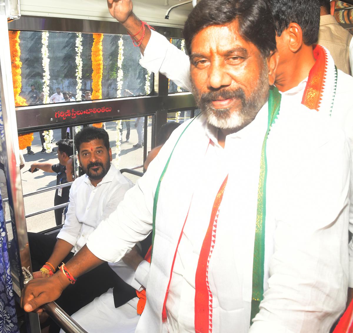 Telangana Chief Minister A Revanth Reddy and Deputy Chief Minister Mallu Bhatti Vikramarka taking a ride in the bus he flagged off after launching Mahalakshmi Scheme in Hyderabad on Saturday.