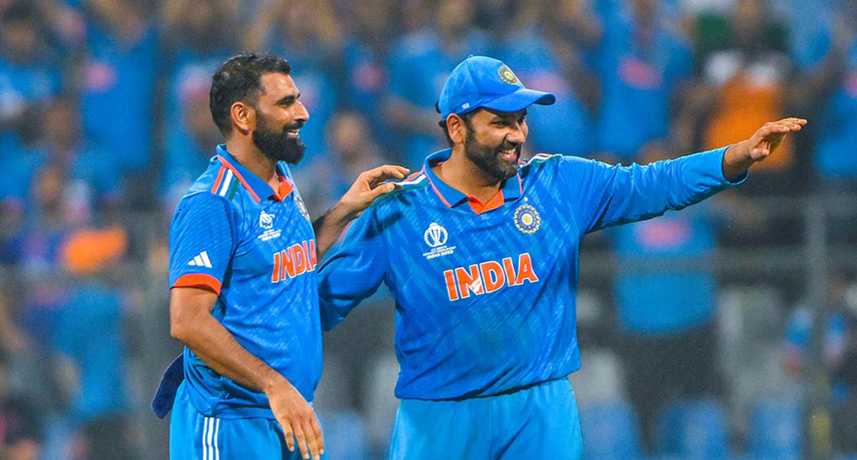 Mohammed Shami and Rohit Sharma celebrate after winning ICC Cricket World Cup 2023 semifinal 1 between India and New Zealand.