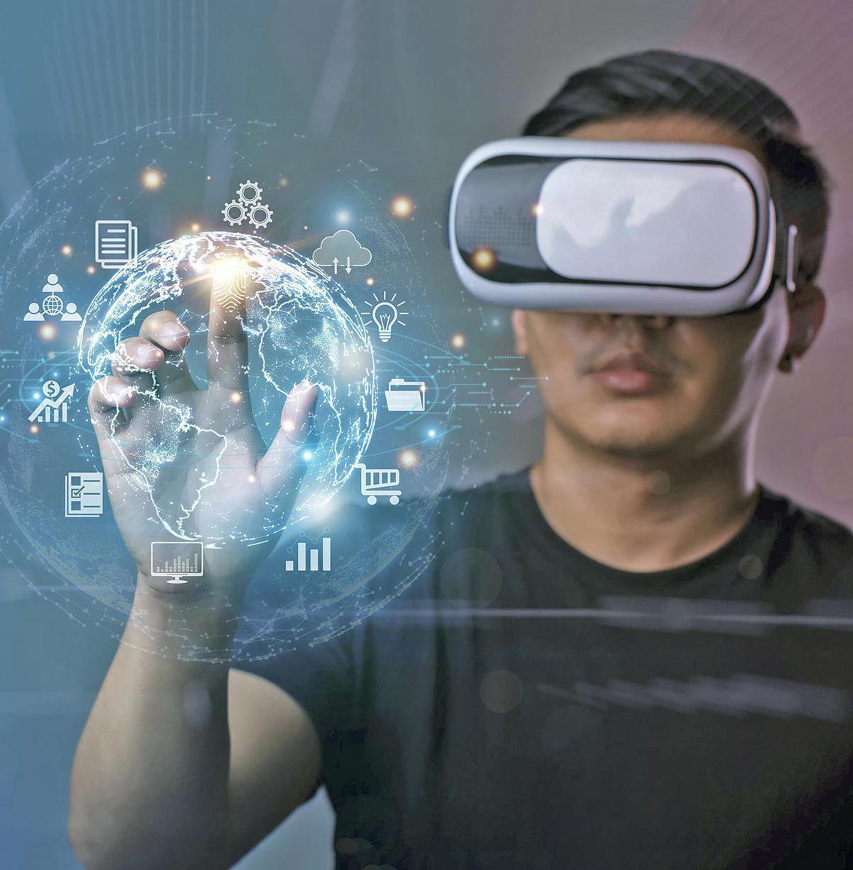 Metaverse and Future digital technology.Man wearing VR glasses hand touching virtual Global Internet connection metaverse.Global Business, Digital marketing, Metaverse, Digital link tech, Big data