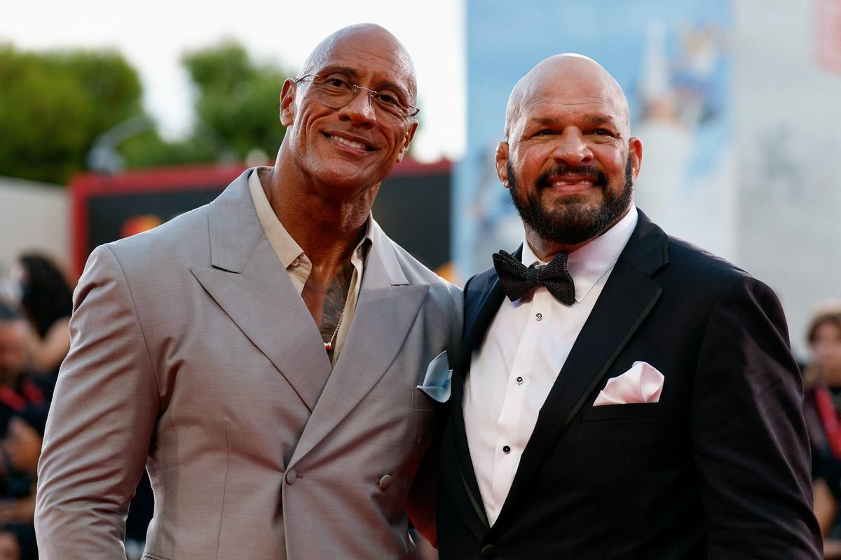 Mark Kerr and Dwayne Johnson pose on the red carpet during arrivals for the screening “The Smashing Machine” in competition, at the 82nd Venice Film Festival, Venice, Italy, September 1, 2025.