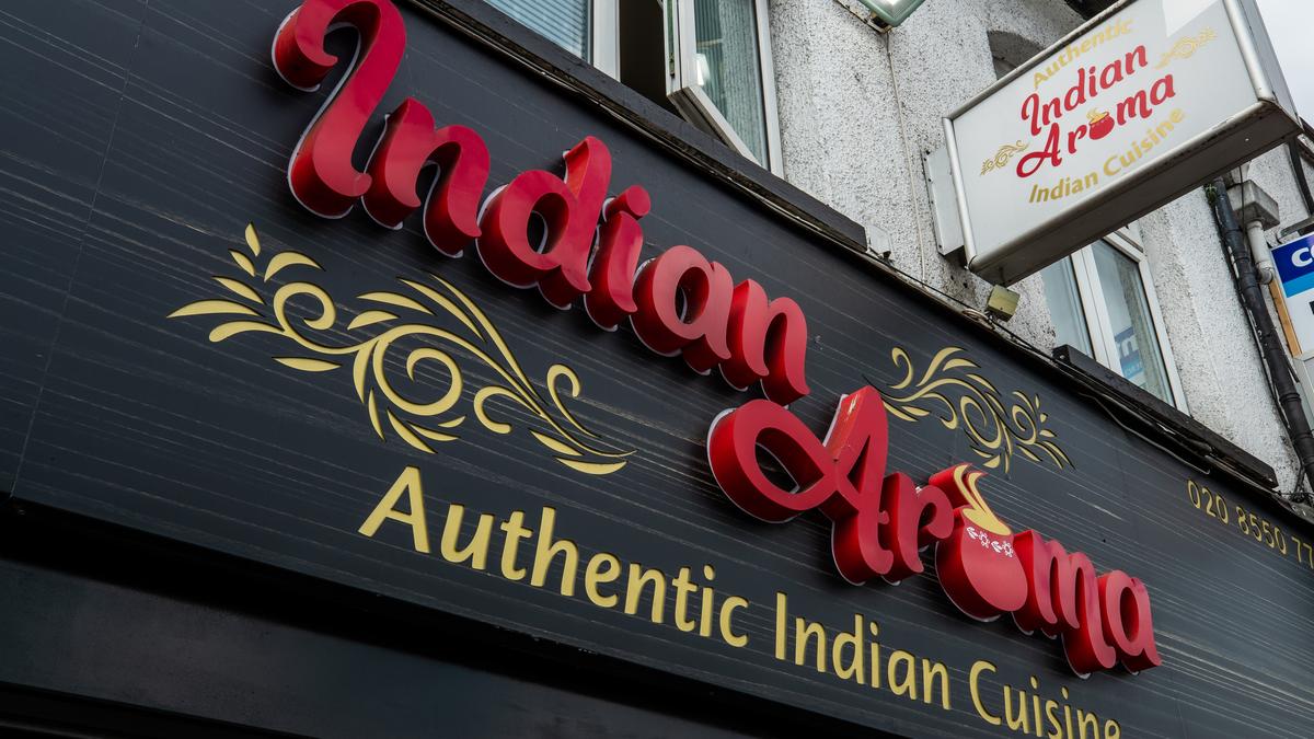 London Indian restaurant arson injures five; suspects arrested after attack