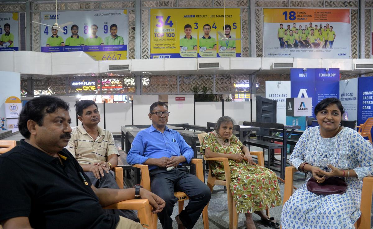 Parents wait at the Allen Career Institute in Kota. 
