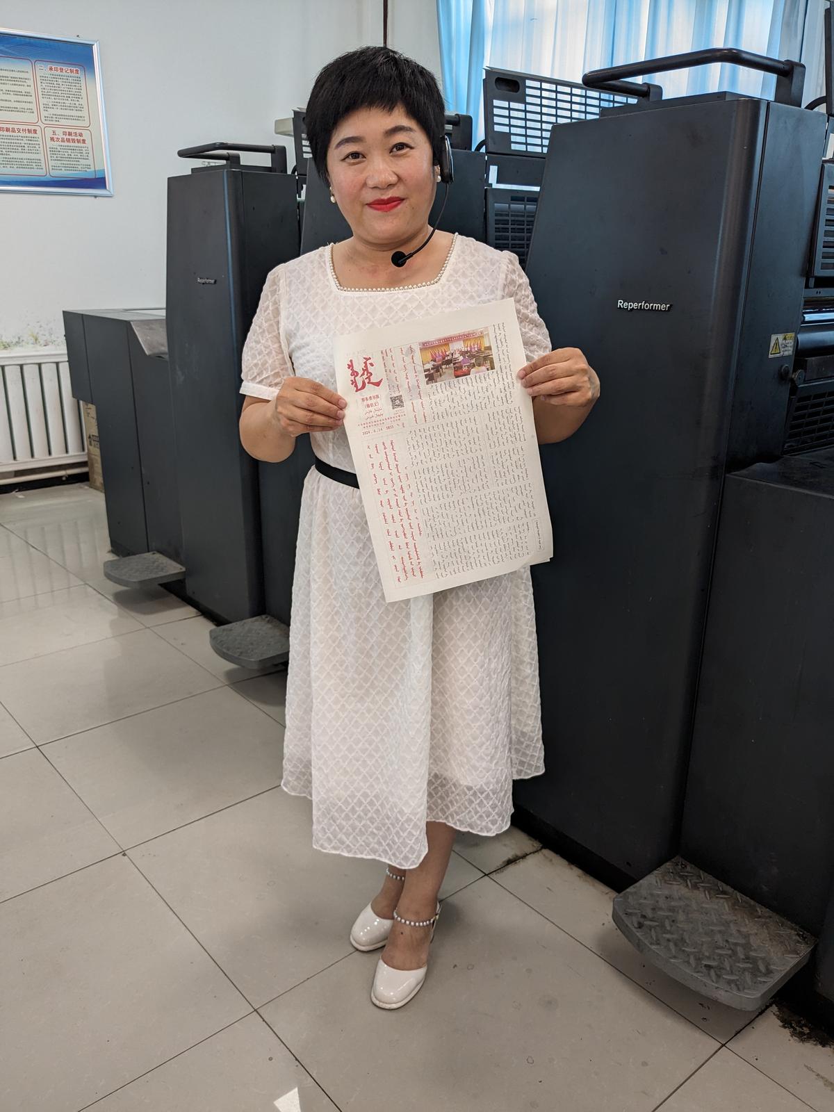 Zhao Jinxiu, one of the editors of the Chabuchar Daily tabloid, which is published in the Xibe language. 