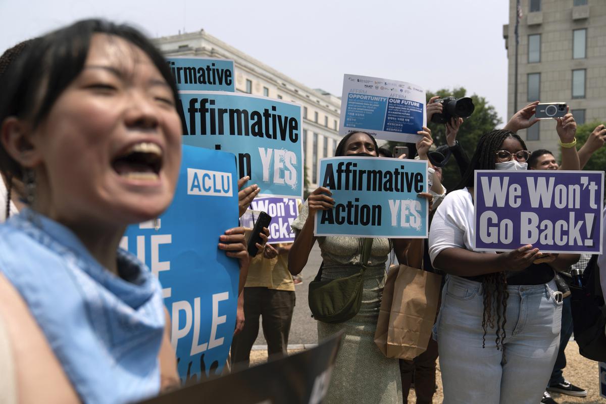 People protest outside of the Supreme Court in Washington, on June 29, 2023. The Supreme Court on Thursday struck down affirmative action in college admissions, declaring race cannot be a factor and forcing institutions of higher education to look for new ways to achieve diverse student bodies. 