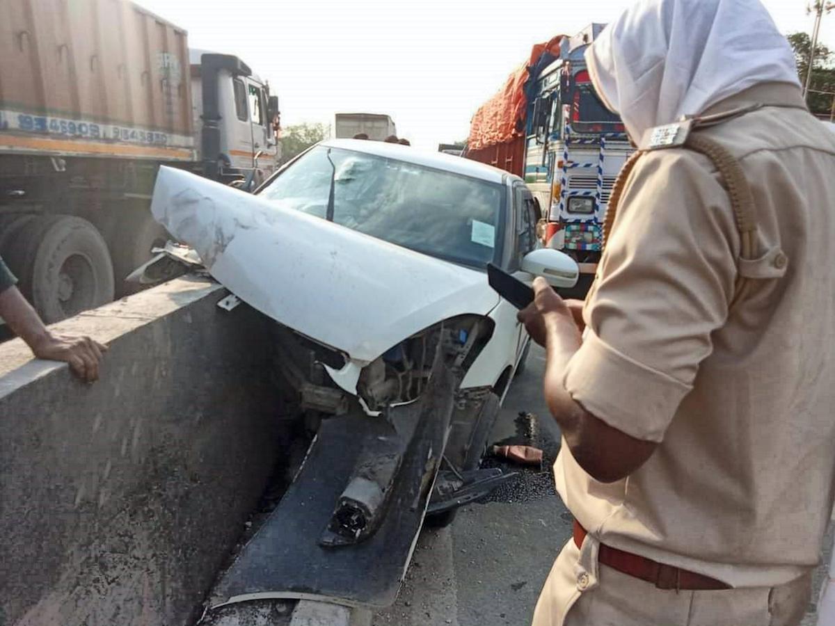 A policeman investigates after a car carrying Bollywood actor Pankaj Tripathi’s sister Sabita Tiwari and brother-in-law Rakesh Tiwari met with an accident, in Dhanbad, Saturday, April 20, 2024. Rakesh was declared dead at the Shahid Nirmal Mahto Medical College Hospital, where he was rushed to after the accident, and Savita, who suffered a leg fracture, is out of danger.