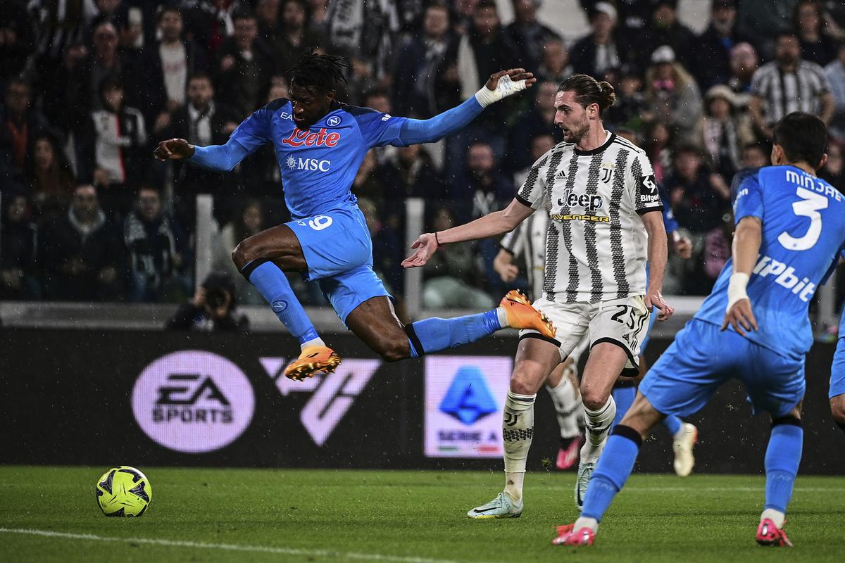 Hirving Lozano of Napoli and Adrien Rabiot of Juventus compete for the ball during the Italian Serie A soccer match between Juventus and Napoli on April 23, 2023.