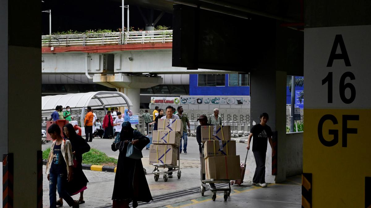 Shifting of cab pick-up point to multilevel car park irks air passengers