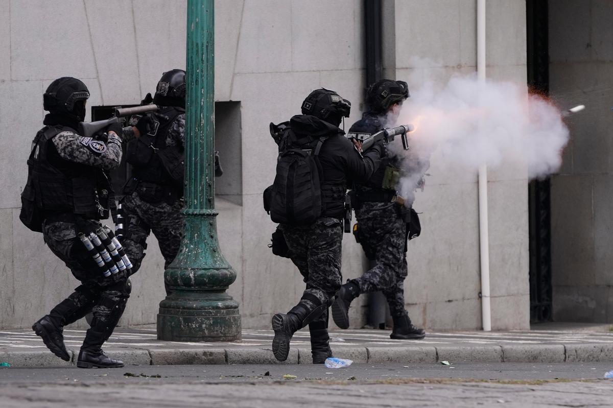 Police fire tear gas at an anti-government protest in La Paz, Bolivia, on Friday, May 22, 2026.