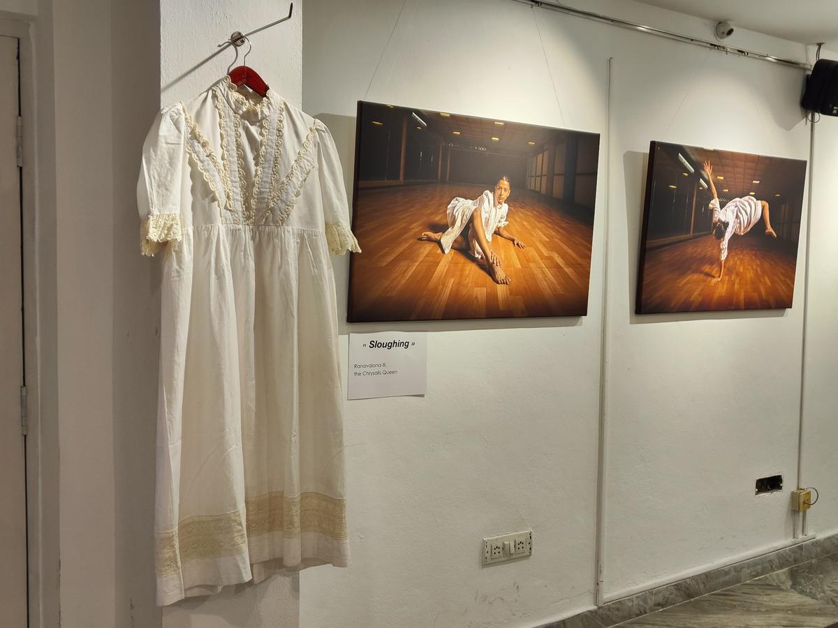 Photographs and the outfit on display; By Christian Randrianampizafy