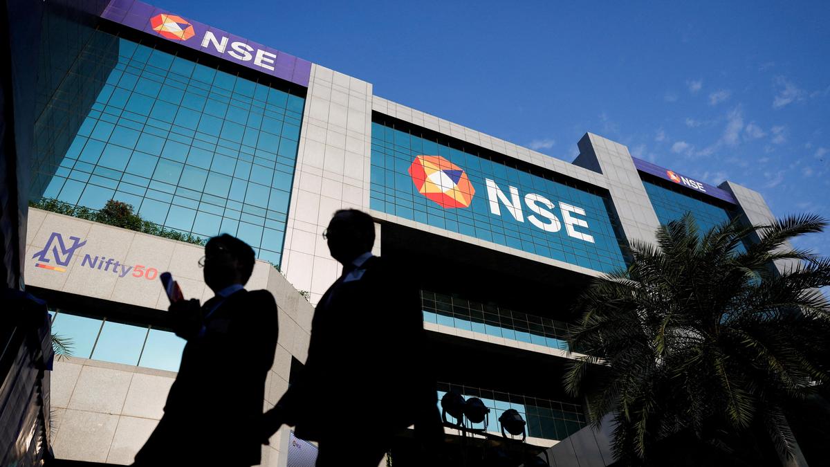 Stock markets end marginally lower in volatile trade