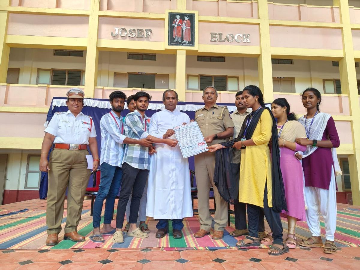 The speakers at the cyber crime awareness programme at Ananda College in Devakottai.