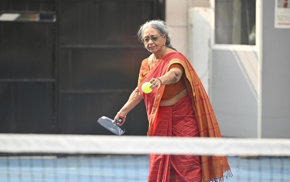  Mala Subramanian playing pickleball.