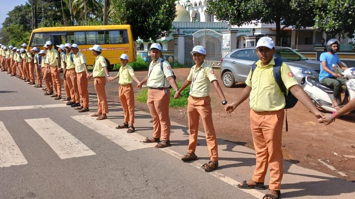 Human chain formed on International Day of Democracy in Dakshina Kannada and Udupi districts