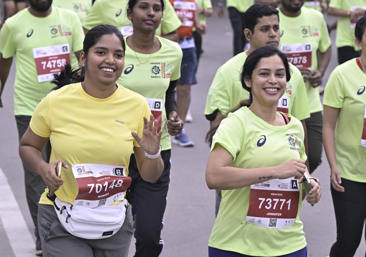 Runners in action during the 14th edition of the NMDC Hyderabad Marathon in Hyderabad on Saturday.