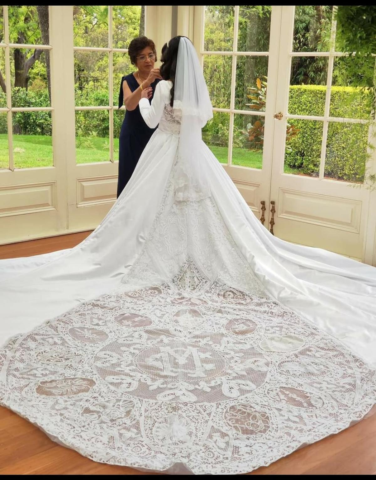 A wedding gown trail in Bruges Lace made at the Infant Jesus Technical and Educational Institution, Mulagumoodu 