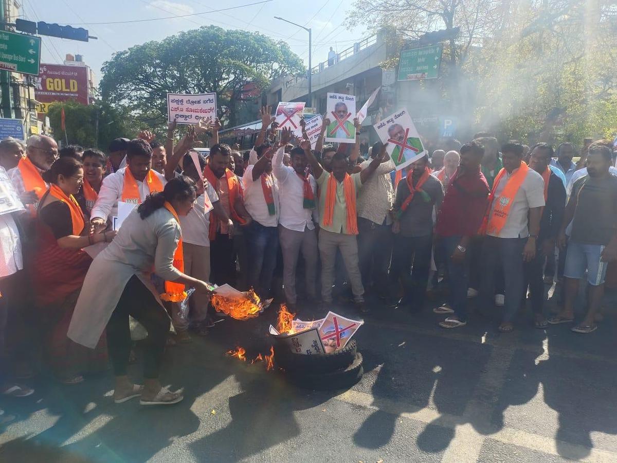 BJP workers in Bengaluru on February 27, 2024 protest against Yeshavantpur MLA S.T. Somasekhar, who has cross-voted in the Rajya Sabha elections. 